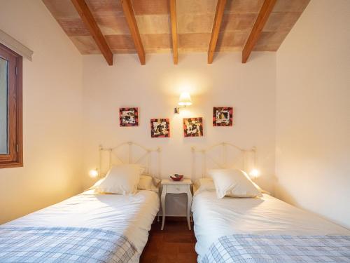 Postel nebo postele na pokoji v ubytování Villa Bell Lloc by SOMNIA