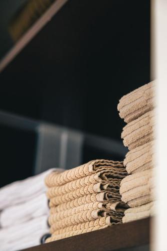 a stack of books sitting on a table at Casa Bembo in Asolo