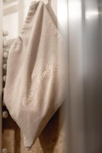 a towel hanging on the side of a refrigerator at Casa Bembo in Asolo