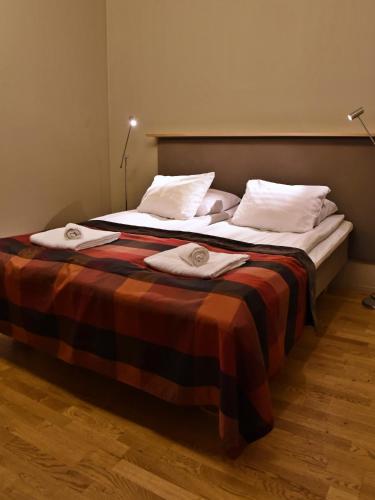 Katil atau katil-katil dalam bilik di Levi Suites Unna Mànnu