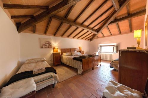 Postel nebo postele na pokoji v ubytování Casa del Priore