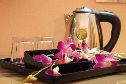 Příslušenství pro přípravu čaje a kávy v ubytování Hotel Balik Pulau