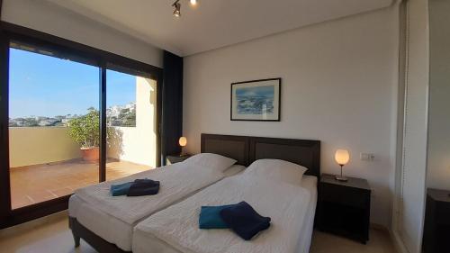 Posteľ alebo postele v izbe v ubytovaní MEYER'S APARTMENTS MARBELLA - serviced luxury homes