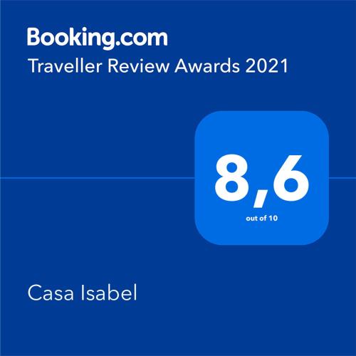 a screenshot of a cell phone with a travel review award at Casa Isabel in Olvés