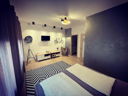 Ένα ή περισσότερα κρεβάτια σε δωμάτιο στο Harteneck Apartments