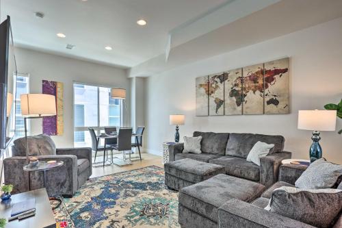 a living room with a couch and a table at Trendy Denver Townhome - Walk to Mile High Stadium in Denver