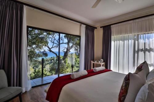 Postel nebo postele na pokoji v ubytování Mosselbos Self Catering