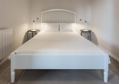 Säng eller sängar i ett rum på Casa Boixader
