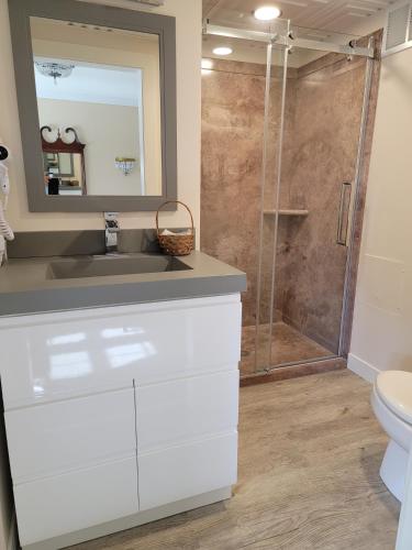 a bathroom with a sink and a shower at Lowell Inn in Stillwater