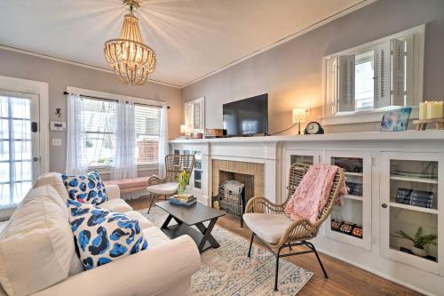 a living room with a couch and a fireplace at Pet-Friendly OKC Home, 3 Miles to Downtown! in Oklahoma City