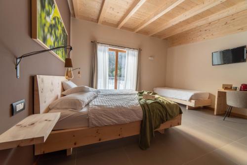 Llit o llits en una habitació de Bosc del Meneghì