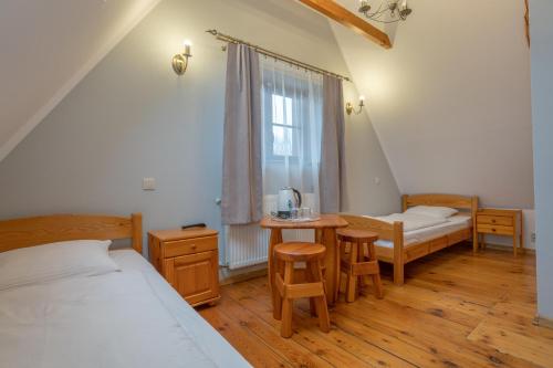 Postel nebo postele na pokoji v ubytování Willa pod Szrenicą