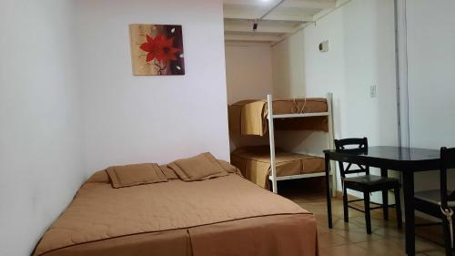 Postel nebo postele na pokoji v ubytování Rada Tilly Apart Hotel