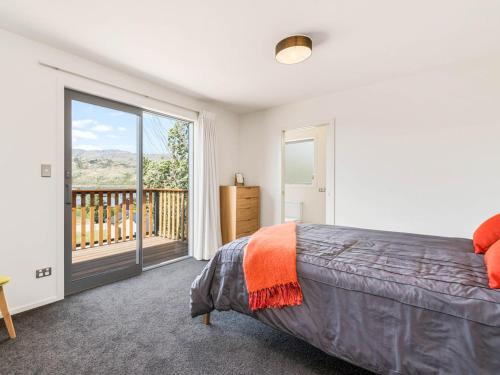 Ένα ή περισσότερα κρεβάτια σε δωμάτιο στο Pisa View Paradise - Cromwell Holiday Home