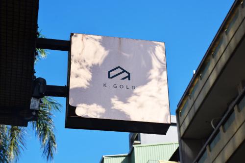 a sign for kokoolis on the side of a building at K. Gold in Taichung