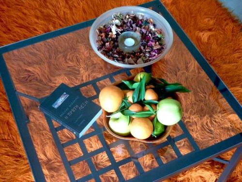 a bowl of fruit on top of a table at The Seasons of Nickolas in Ayia Evfimia