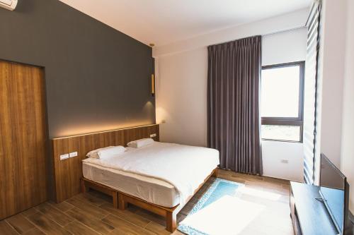Cama o camas de una habitación en Coolbreeze homestay