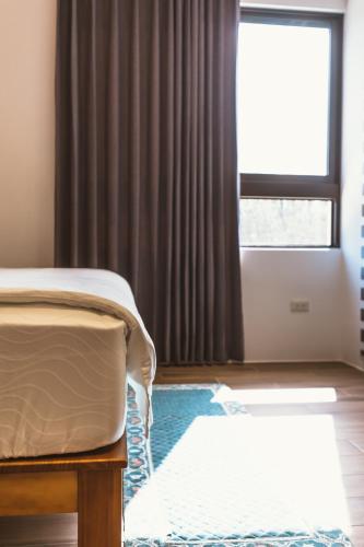 Cama o camas de una habitación en Coolbreeze homestay