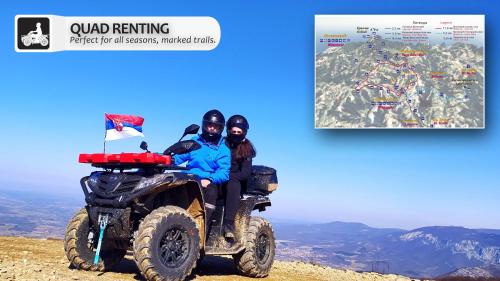 two people sitting on a four wheeler on a mountain at Eco Farm Milanovic in Despotovac