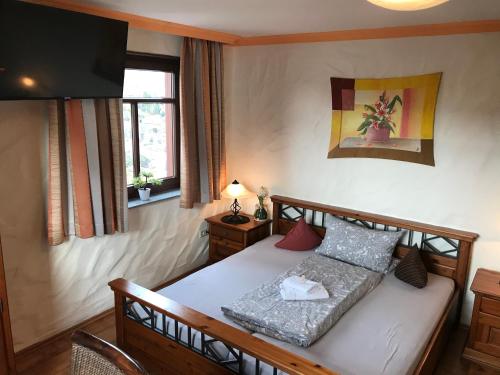 Postel nebo postele na pokoji v ubytování Landhotel Lindenhof
