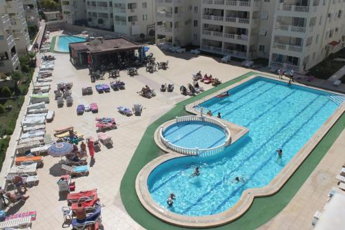an overhead view of a swimming pool in a building at Royal Marina in Didim