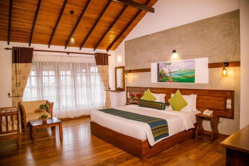 Ліжко або ліжка в номері Seasons Villa - Nuwara Eliya