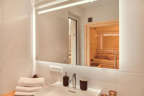 Koupelna v ubytování die Tauplitz Lodges - Alm Lodge A6 by AA Holiday Homes