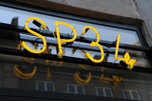 a sign on a building at Hotel SP34 by Brøchner Hotels in Copenhagen