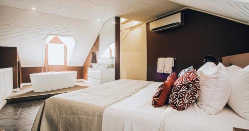 Postel nebo postele na pokoji v ubytování Terra Boutique Hotel Curaçao