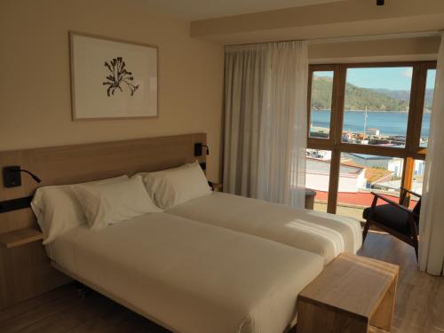 Postelja oz. postelje v sobi nastanitve Hotel do Porto