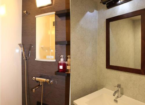 A bathroom at カフェロッジ Touch Wood