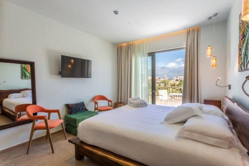 Katil atau katil-katil dalam bilik di Elysian Luxury Hotel and Spa