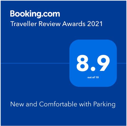 Certificado, premio, señal o documento que está expuesto en New and Comfortable with Parking