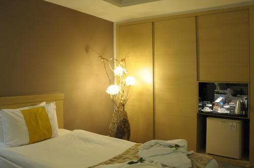 Katil atau katil-katil dalam bilik di SV Business Hotel Diyarbakır