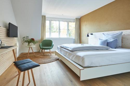 Katil atau katil-katil dalam bilik di Nordenholzer Hofhotel