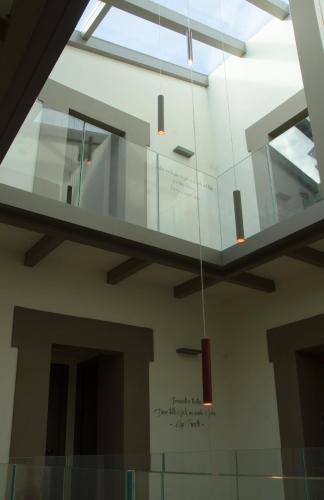 a glass ceiling in a building with a window at Antico Sipario Boutique Hotel, BW Signature Collection in Paciano