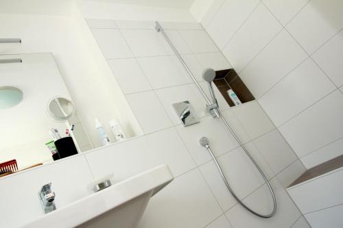 Ένα μπάνιο στο Ferienwohnung Fembacher