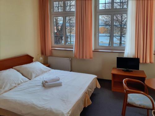 Postel nebo postele na pokoji v ubytování Hotel Casanova