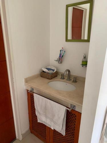a bathroom with a sink and a mirror at Pueblo Maschwitz in Ingeniero Maschwitz