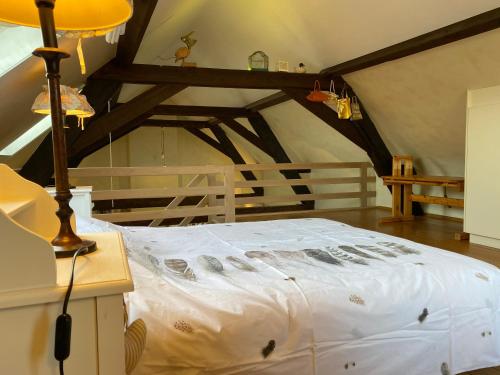 Postel nebo postele na pokoji v ubytování Vakantiewoning Jérôme