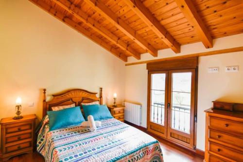 Postel nebo postele na pokoji v ubytování Precioso apartamento reformado en Liencres
