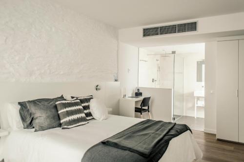 Postel nebo postele na pokoji v ubytování Tramuntana Hotel - Adults Only