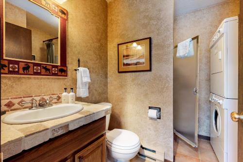 a bathroom with a sink and a toilet at Granite A in Jackson