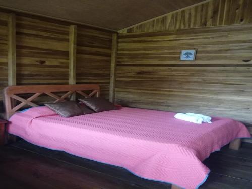 מיטה או מיטות בחדר ב-Rincon Verde