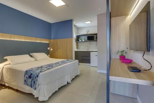 Cama ou camas em um quarto em Hotel Sete Ilhas