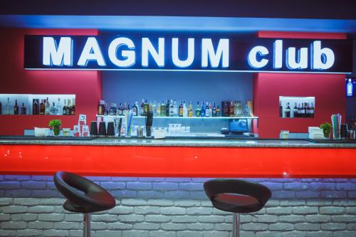 Lounge nebo bar v ubytování Magnum