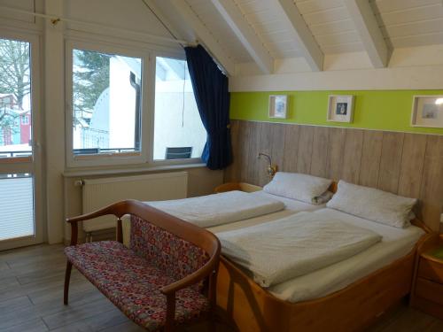 Ένα ή περισσότερα κρεβάτια σε δωμάτιο στο Gästehaus Steker