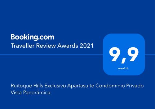 a blue box with the text traveler review awards at Ruitoque Hills 23 Exclusivo Apartasuite Condominio Privado Espectacular Vista Panorámica 180 grados 3Habitaciones in Floridablanca