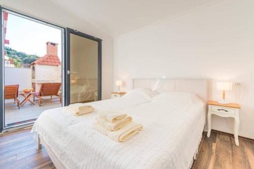 Posteľ alebo postele v izbe v ubytovaní Apartment Nika Solitudo