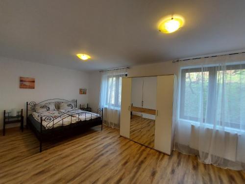 Postel nebo postele na pokoji v ubytování Pure Nature Refuge Apartment